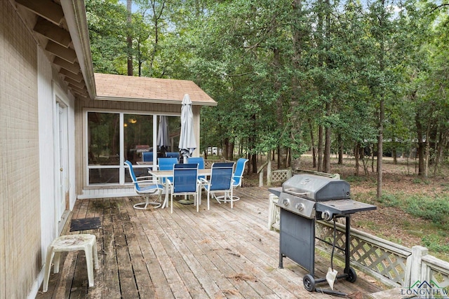 wooden deck with grilling area