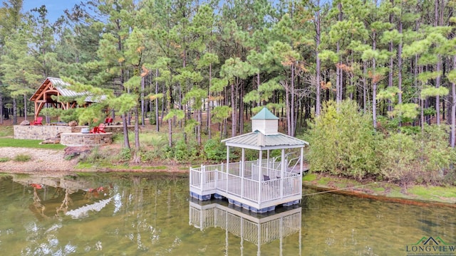 dock area with a water view and a gazebo