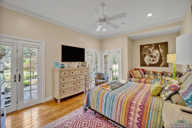 bedroom with access to outside, french doors, and light wood-type flooring