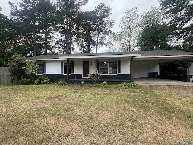 single story home with a carport, a front lawn, covered porch, and fence