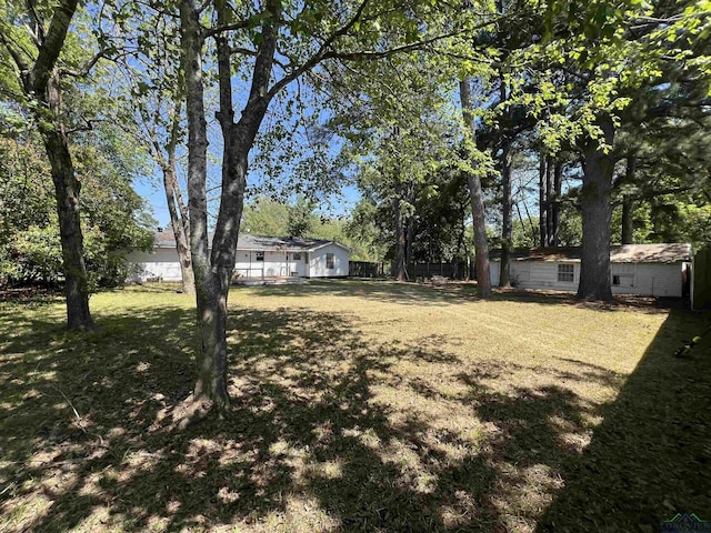 view of yard with fence