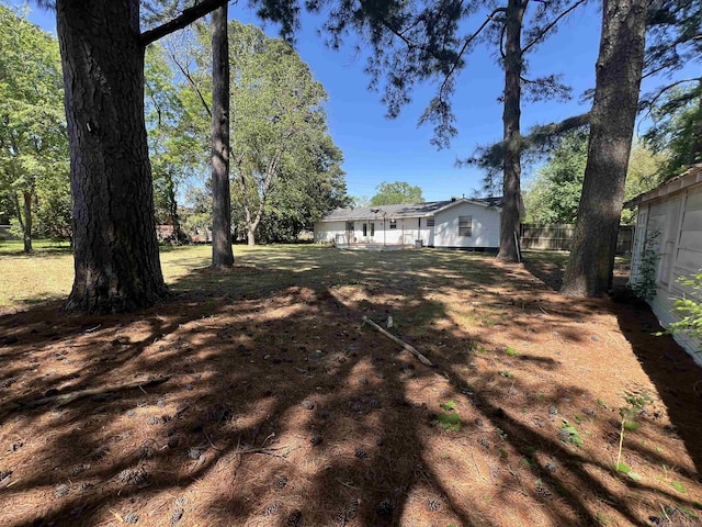 view of yard with fence