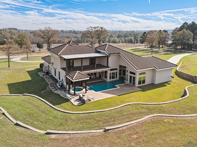 back of house featuring a patio