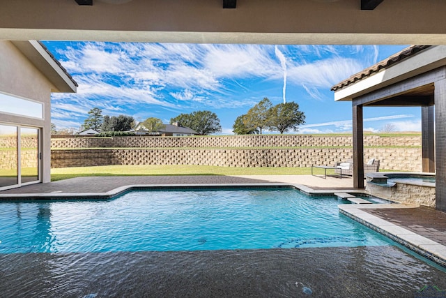 view of swimming pool with an in ground hot tub and a patio