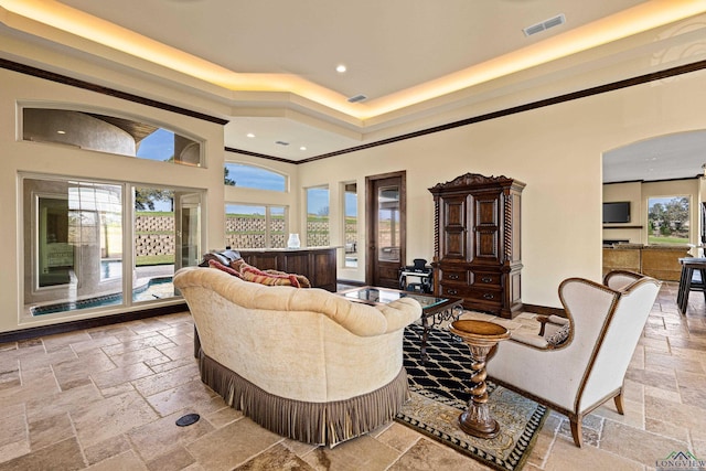 living room with crown molding