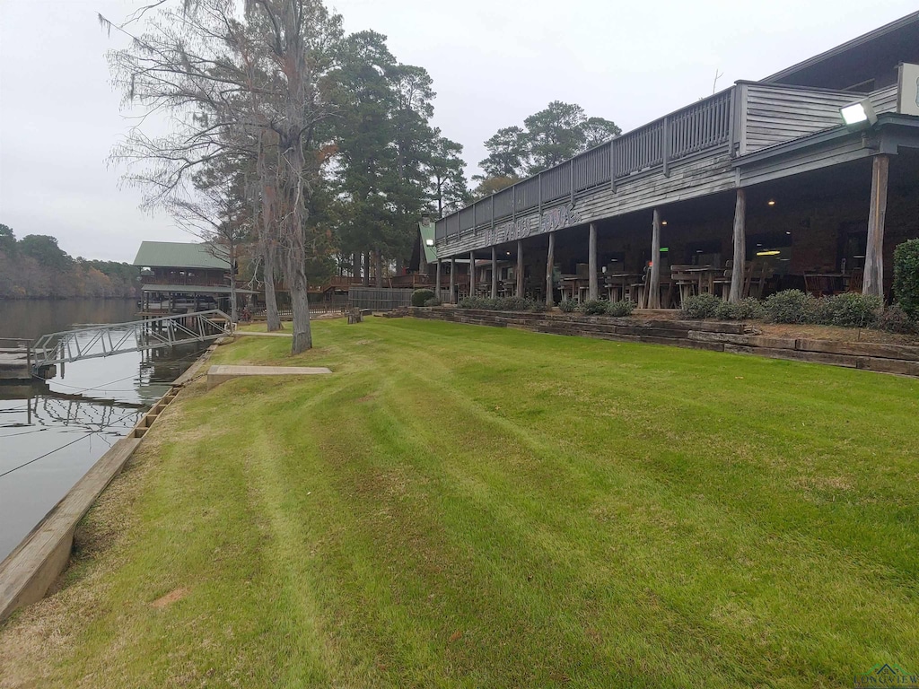 view of yard with a water view