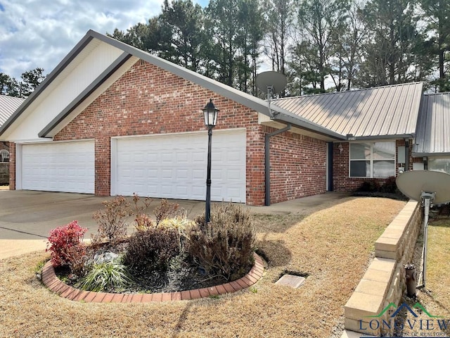 view of property exterior with a garage