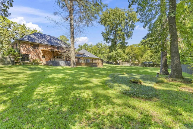 view of yard featuring a deck