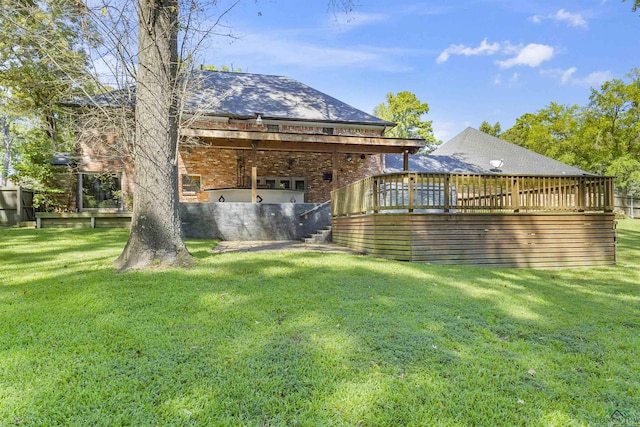 view of yard with a deck