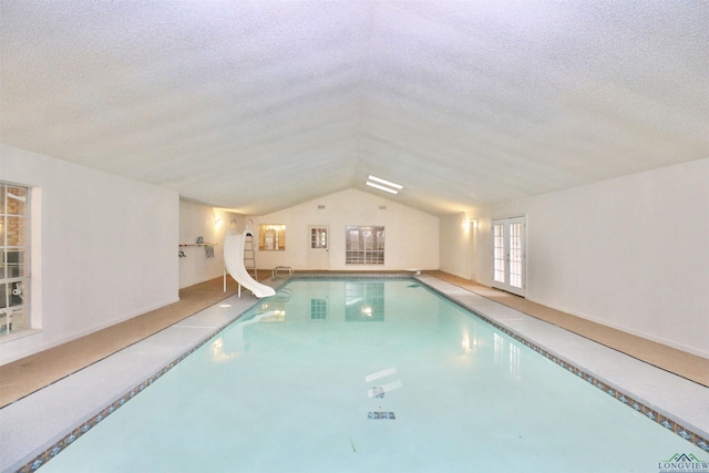 view of swimming pool featuring a water slide