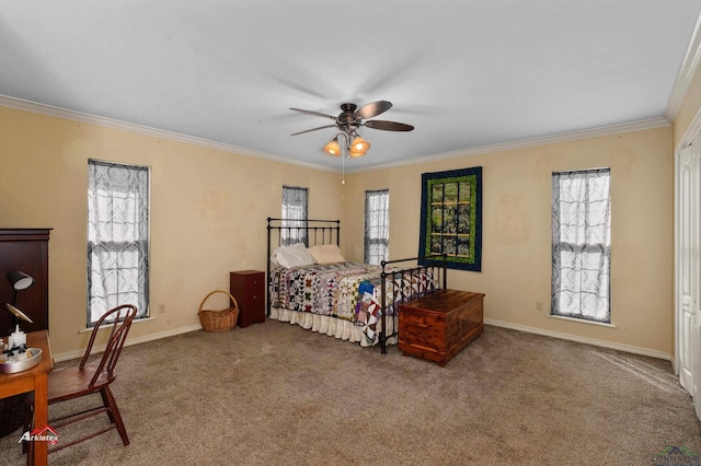 bedroom with ceiling fan, carpet, and ornamental molding