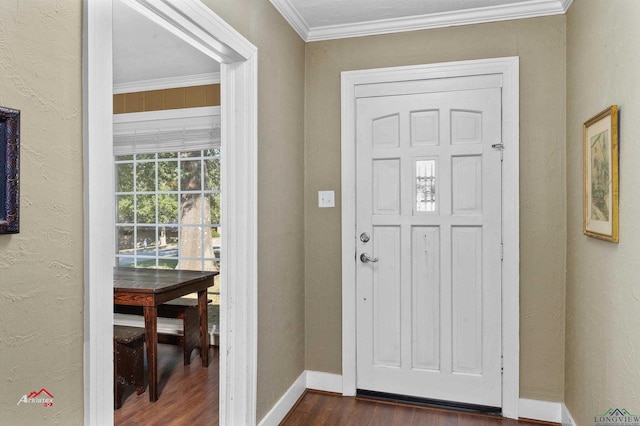 entryway with dark hardwood / wood-style flooring and ornamental molding