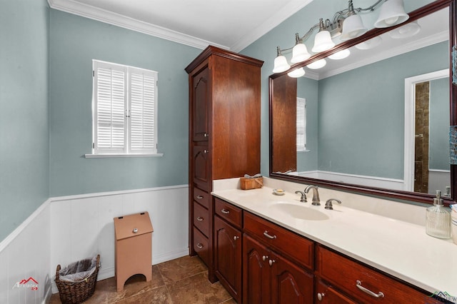 bathroom with vanity and ornamental molding