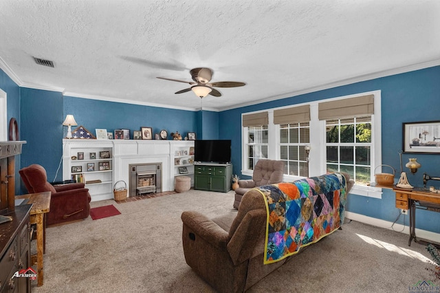 carpeted living room with a textured ceiling, ceiling fan, and crown molding