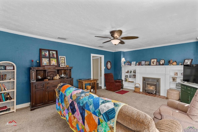 carpeted living room featuring a textured ceiling, ceiling fan, and ornamental molding