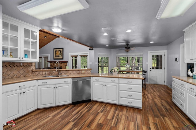 3718 Ben Hogan Dr, Longview, TX 75605 - kitchen with stainless steel dishwasher, a sink, dark wood finished floors, ceiling fan, and recessed lighting