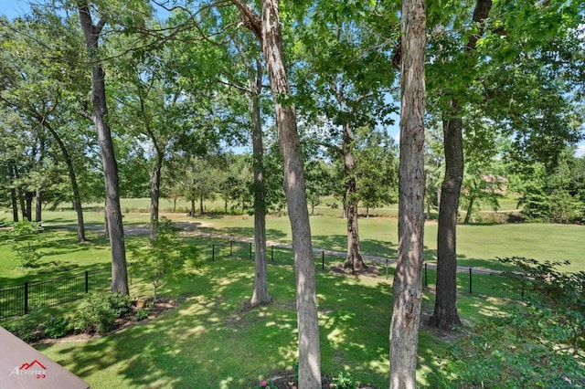 3718 Ben Hogan Dr, Longview, TX 75605 - view of yard with view of wooded area