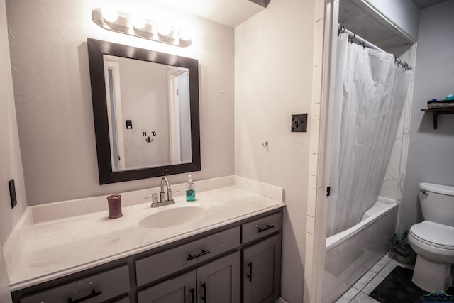 full bathroom featuring tile patterned floors, vanity, toilet, and shower / bath combo with shower curtain