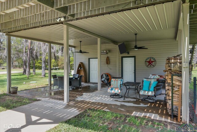 view of patio featuring ceiling fan