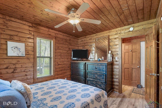 bedroom featuring wood ceiling, ceiling fan, log walls, and light hardwood / wood-style floors