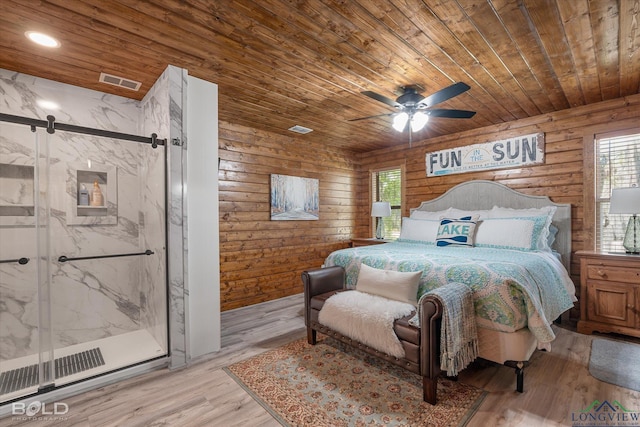 bedroom with ceiling fan, light hardwood / wood-style floors, and wood ceiling