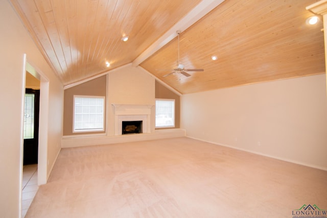 unfurnished living room with light carpet, lofted ceiling with beams, ceiling fan, and wooden ceiling