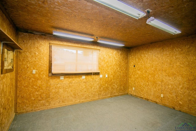 empty room with carpet flooring