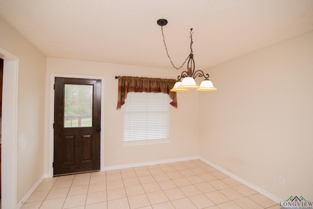 interior space featuring a chandelier