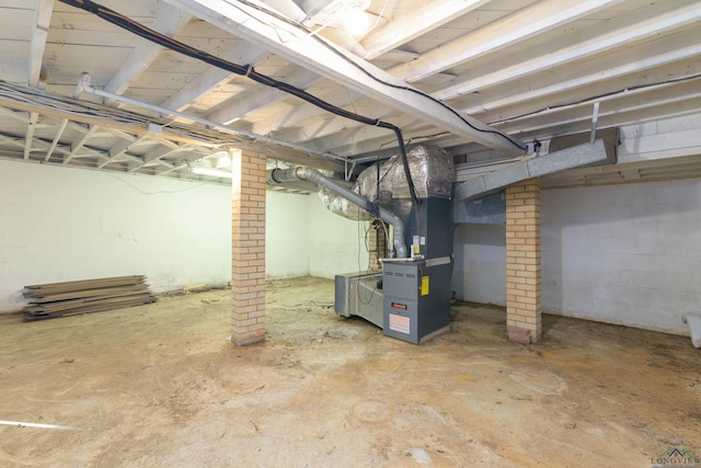 basement featuring heating unit