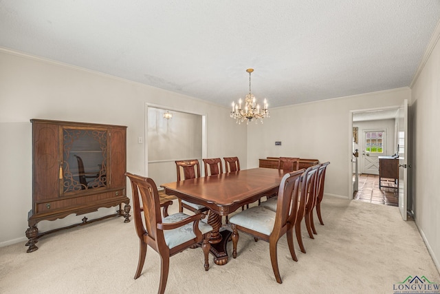 carpeted dining space with ornamental molding and a notable chandelier