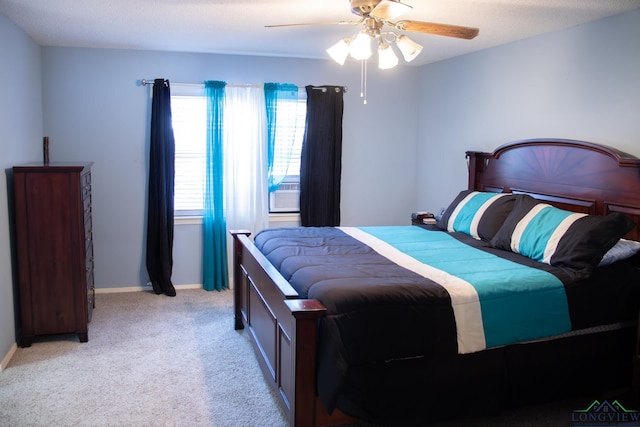 1508 Miami Dr, Longview, TX 75601 - bedroom with light colored carpet, ceiling fan, and baseboards