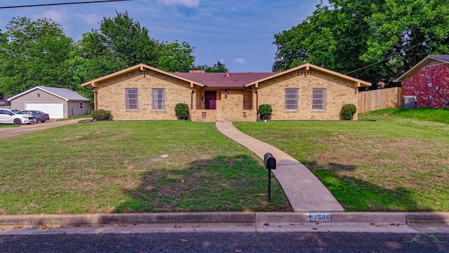 1508 Miami Dr, Longview, TX 75601 - single story home with brick siding, cooling unit, an outdoor structure, and a garage