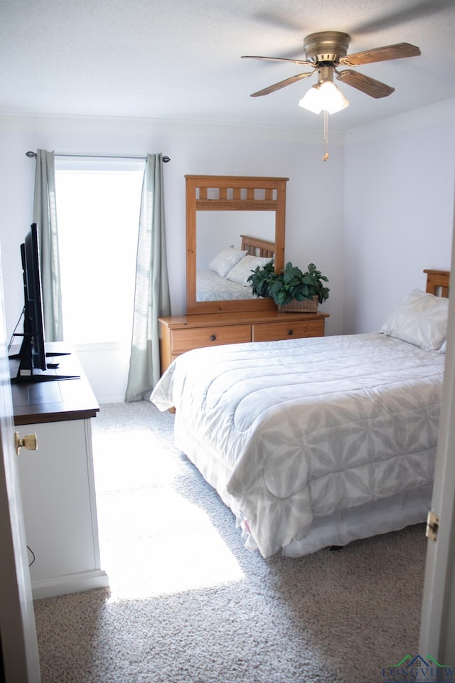 1508 Miami Dr, Longview, TX 75601 - bedroom with carpet and a ceiling fan