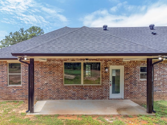 rear view of property with a patio area