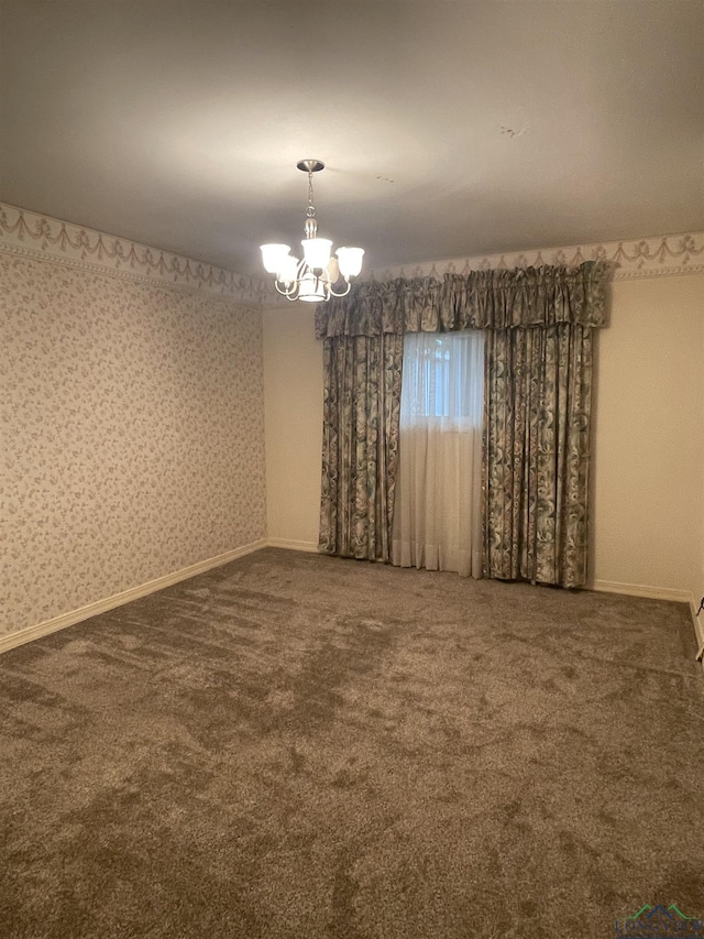 201 Mockingbird Ln, Longview, TX 75601 - unfurnished room with a chandelier and carpet floors