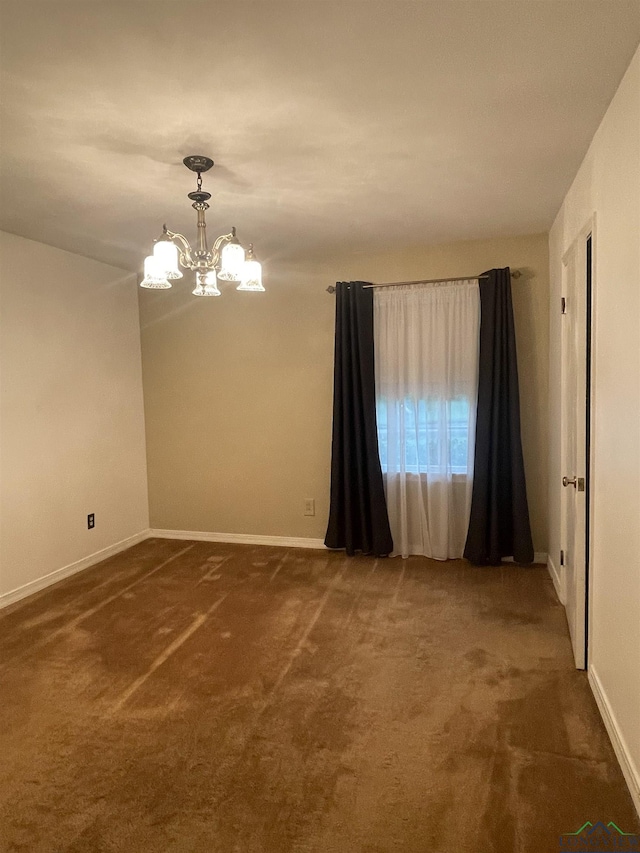 201 Mockingbird Ln, Longview, TX 75601 - unfurnished room with a chandelier and carpet