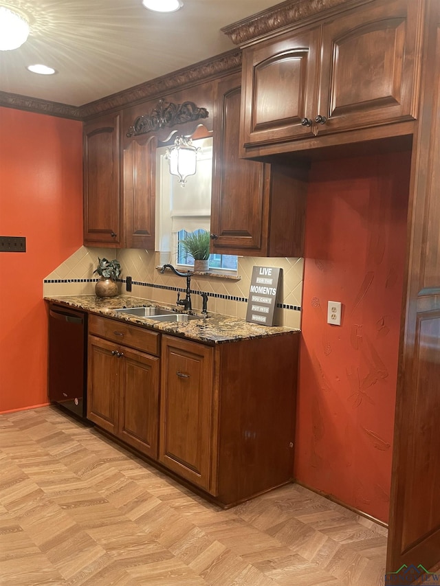 201 Mockingbird Ln, Longview, TX 75601 - kitchen featuring black dishwasher, backsplash, dark stone countertops, and recessed lighting