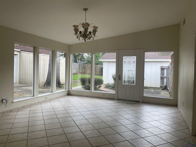 201 Mockingbird Ln, Longview, TX 75601 - unfurnished sunroom with vaulted ceiling and a chandelier
