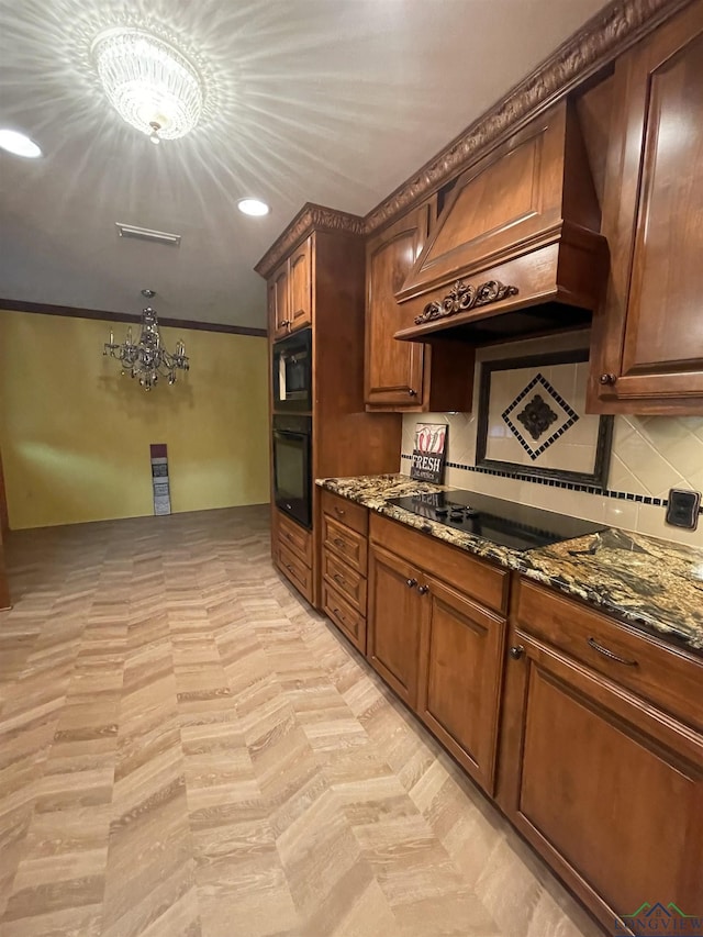 201 Mockingbird Ln, Longview, TX 75601 - kitchen featuring black appliances, dark stone countertops, a chandelier, backsplash, and recessed lighting