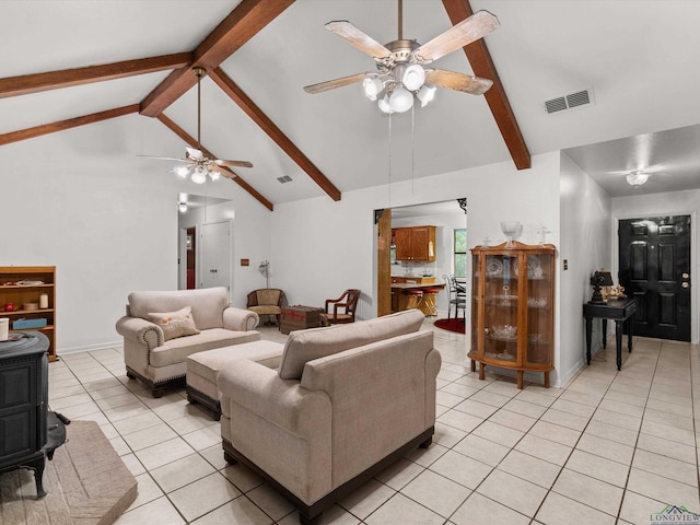 living room featuring beam ceiling, ceiling fan, light tile patterned flooring, and high vaulted ceiling