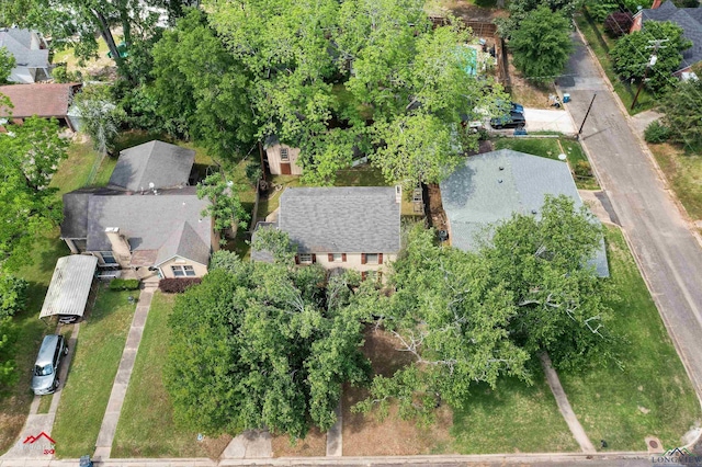 birds eye view of property with a residential view