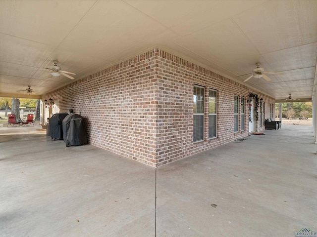 view of patio / terrace featuring ceiling fan