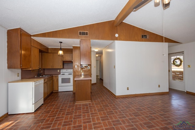 kitchen featuring lofted ceiling with beams, white appliances, decorative light fixtures, and sink