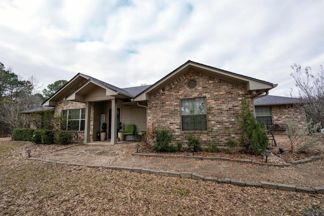 view of front of house with a patio area