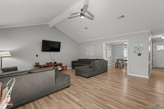 living room featuring vaulted ceiling with beams, light wood-style floors, ornamental molding, a ceiling fan, and baseboards