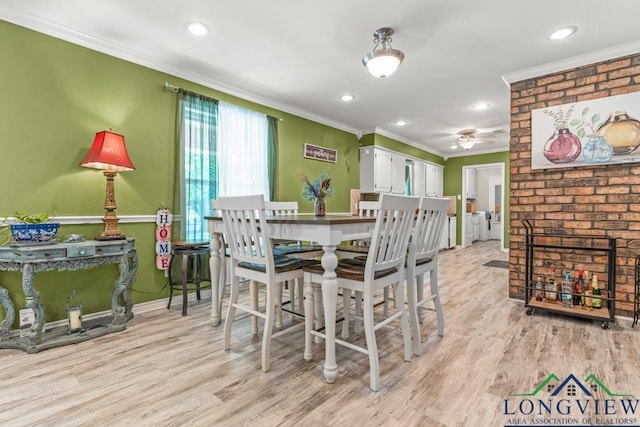 dining space featuring light wood-type flooring, ornamental molding, a ceiling fan, and recessed lighting