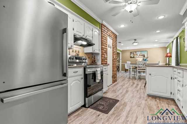 kitchen featuring crown molding, recessed lighting, under cabinet range hood, and stainless steel appliances