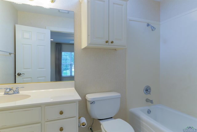 full bathroom featuring vanity, bathing tub / shower combination, and toilet