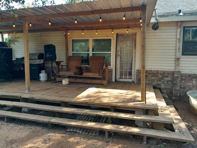 wooden deck with area for grilling