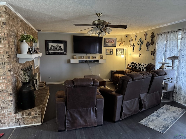 living room featuring a brick fireplace, crown molding, a textured ceiling, and dark wood-style flooring